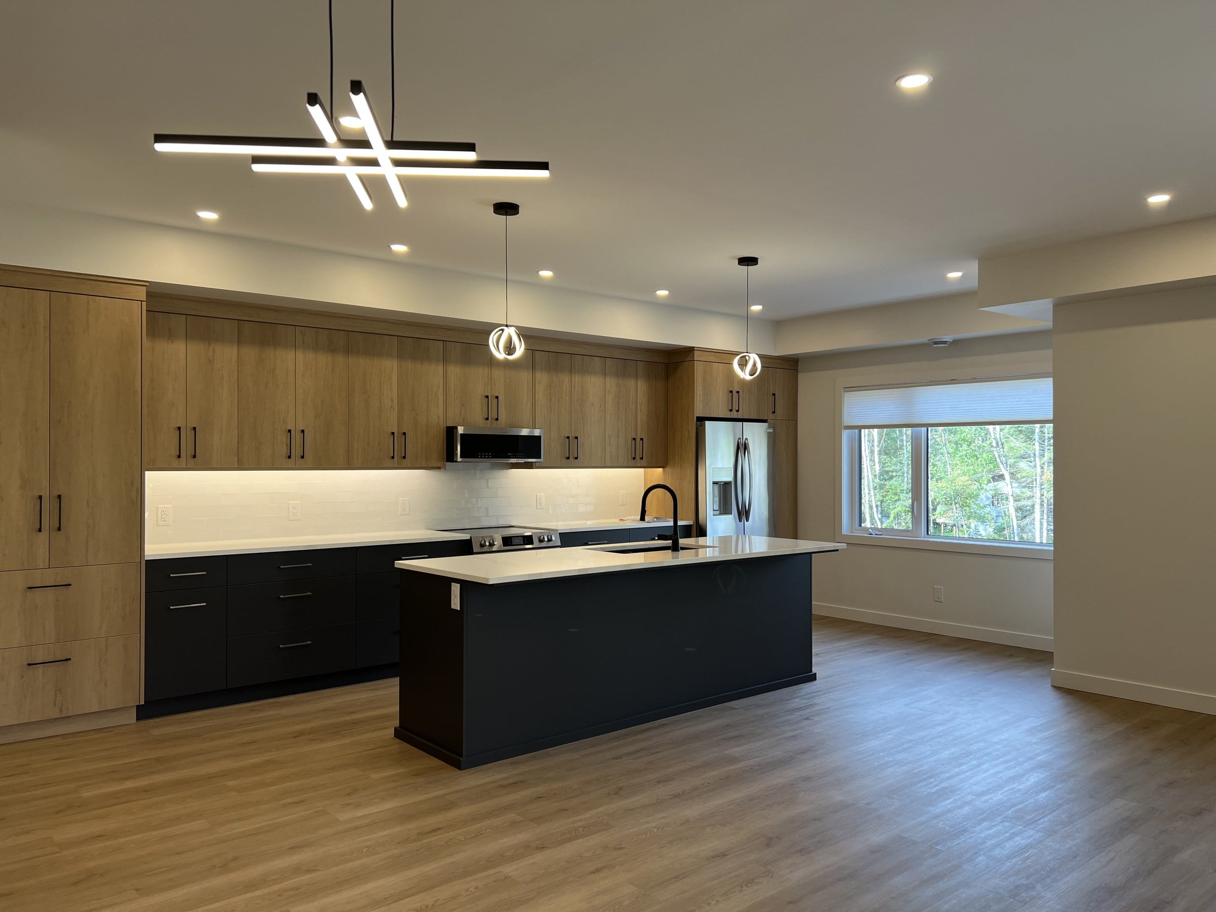 Open concept kitchen with windows